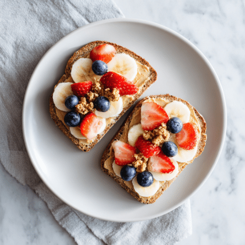 Nut Butter Toast with Banana, Berries & Granola Crunch