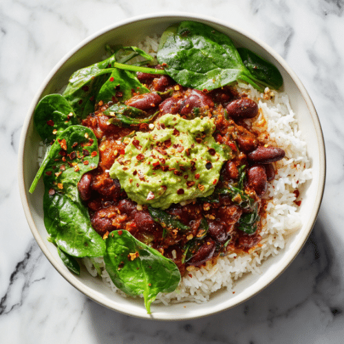 Vegan Bean Chili Bowl with Rice and Guacamole