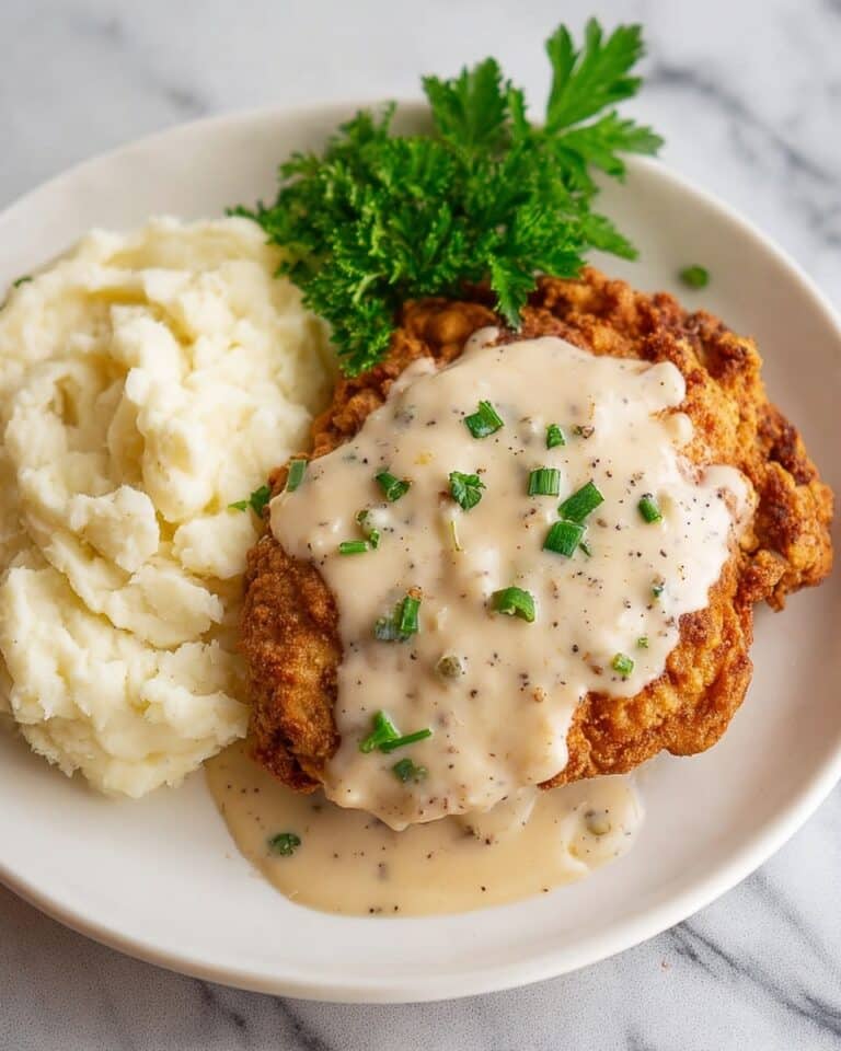 Country Fried Steak with Crispy Coating and Creamy Gravy Recipe