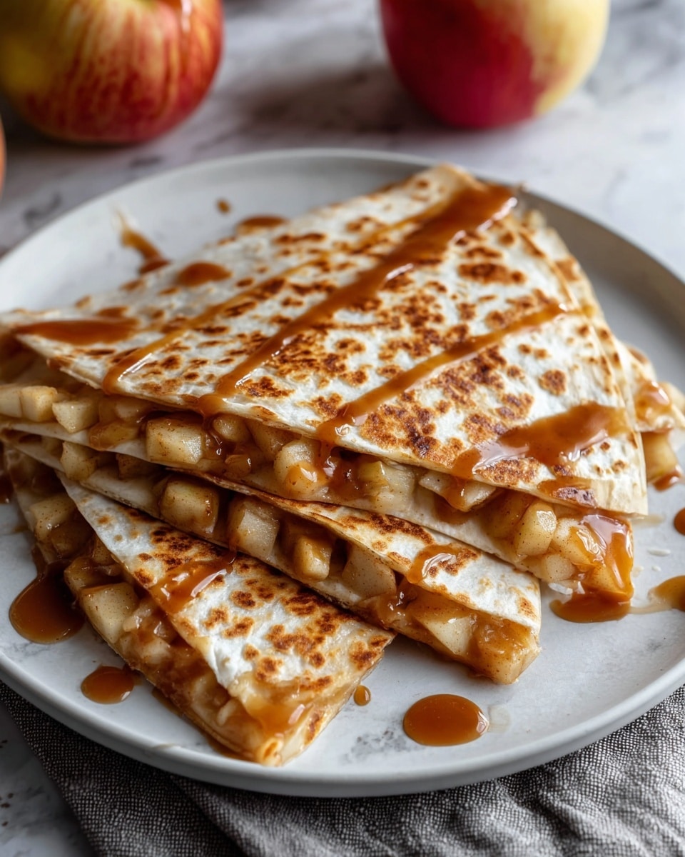 A large white plate showcasing a whole apple cinnamon quesadilla, perfectly folded and golden brown with visible bubbly spots from the griddle, generously filled with tender chunks of spiced apples and creamy melted cheese, drizzled with a rich caramel cinnamon sauce on top, photo taken from a 3/4 angle on a white marble countertop with natural lighting, styled like a hero shot in a food magazine, photo taken with an iphone --ar 4:5 --v 7