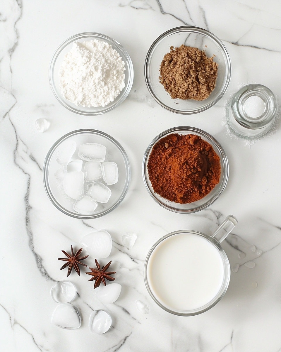 Single clear glass filled with a perfectly layered iced Thai tea, showcasing the vibrant orange tea seamlessly mixing with creamy white milk, ice cubes floating on top catching the natural light, a golden spoon gently immersed, placed on a white saucer over a pristine white marble surface, close-up angled shot capturing the swirling texture and refreshing chill, styled as a ready-to-enjoy single serving from a food blog, photo taken with an iphone --ar 4:5 --v 7