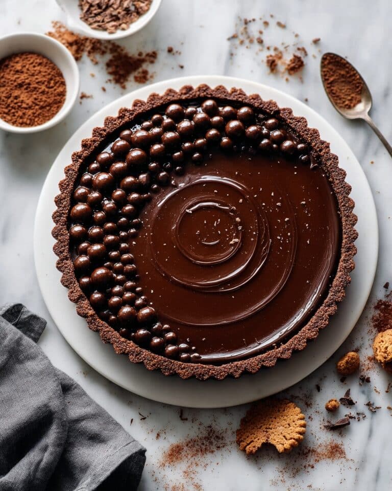 Chocolate Amaretto Tart with Crunchy Pearls Recipe